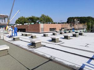 公民館屋上 防水工事・レンガ工事の画像